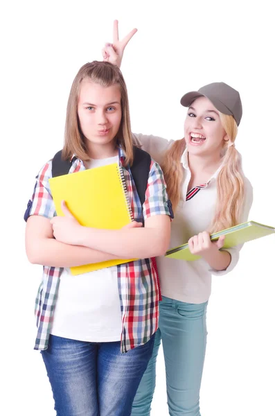 Paar jonge studenten op wit — Stockfoto