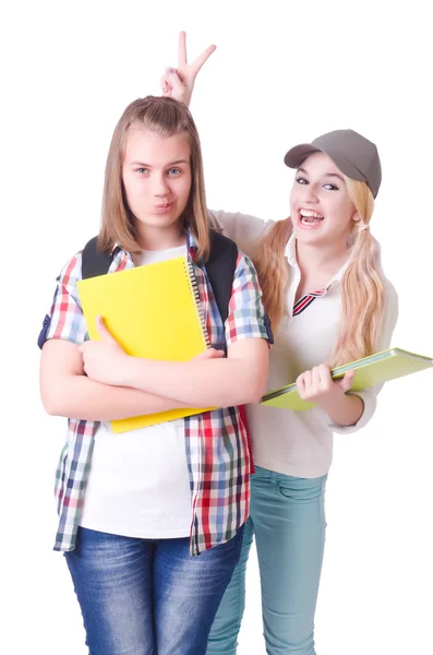 Pareja de jóvenes estudiantes en blanco — Foto de Stock