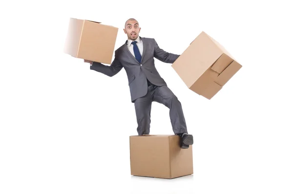 Бизнесмен с коробками — стоковое фото