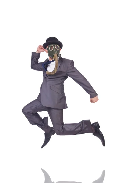 Businessman wearing gas mask Stock Image