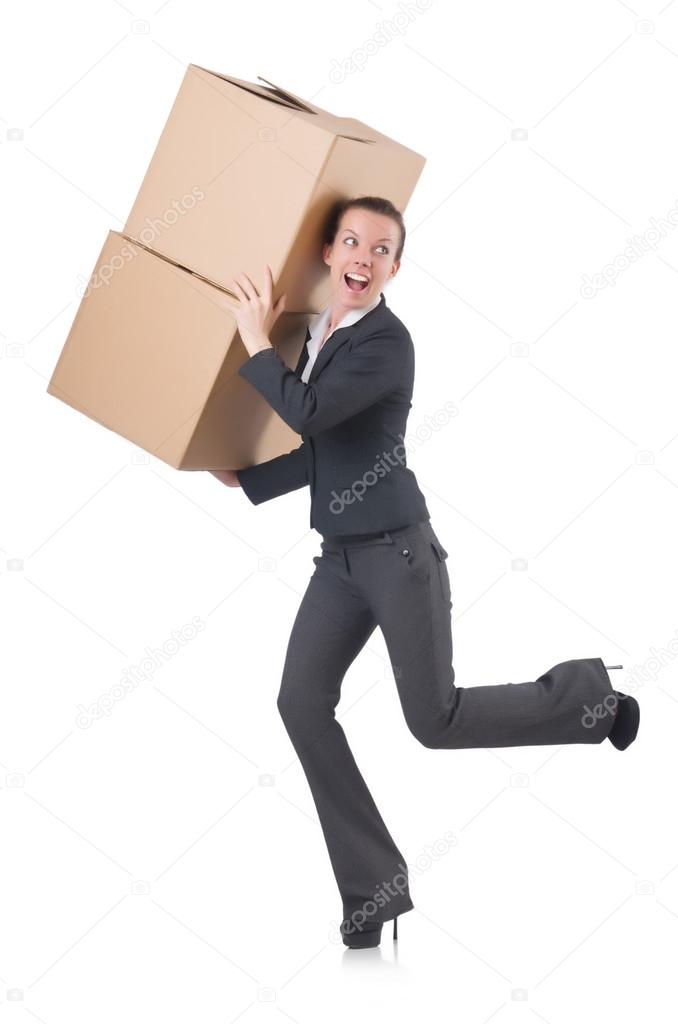 Businesswoman running with boxes
