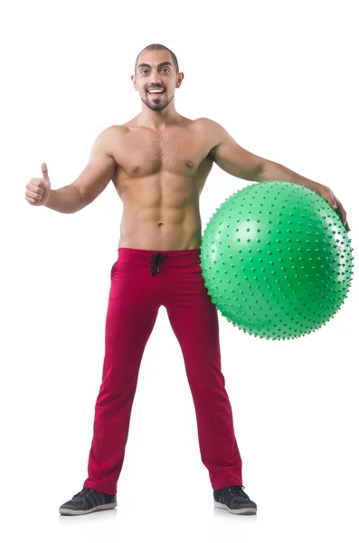 Man with swiss ball doing exercises on white — Stock Photo, Image