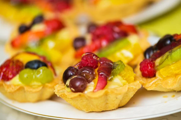 Tasty sweets in the plate — Stock Photo, Image