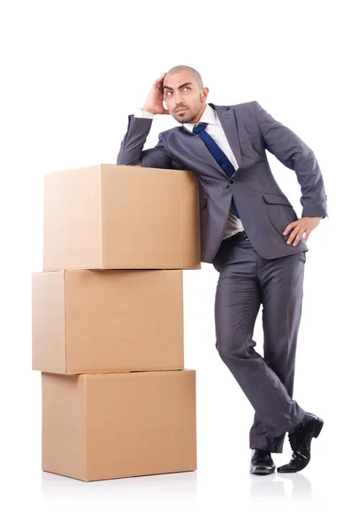 Businessman with box isolated on the white — Stock Photo, Image