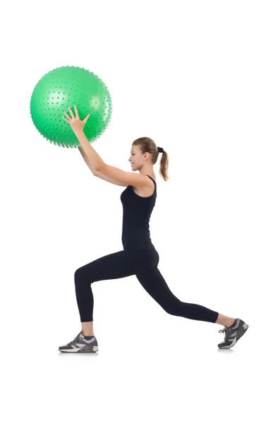 Young woman with ball exercising on whitee — Stock Photo, Image