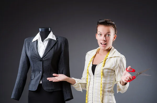 Woman tailor working on clothing — Stock Photo, Image