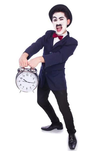 Homme drôle avec horloge sur blanc — Photo