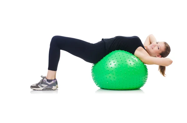 Frau trainiert mit Schweizer Ball auf Weiß — Stockfoto