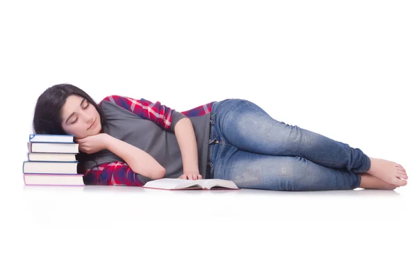 Student mit Büchern auf Weiß — Stockfoto