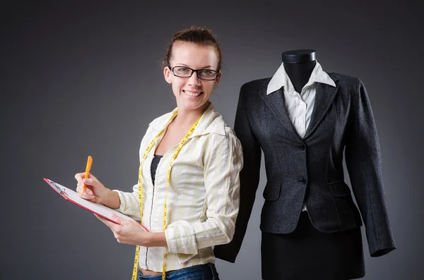 Woman tailor working on clothing — Stock Photo, Image