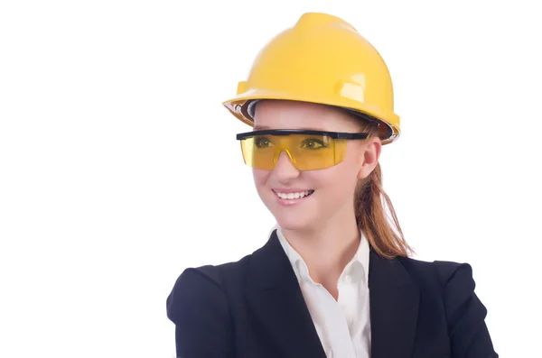 Jeune femme d'affaires avec casque dur sur blanc — Photo