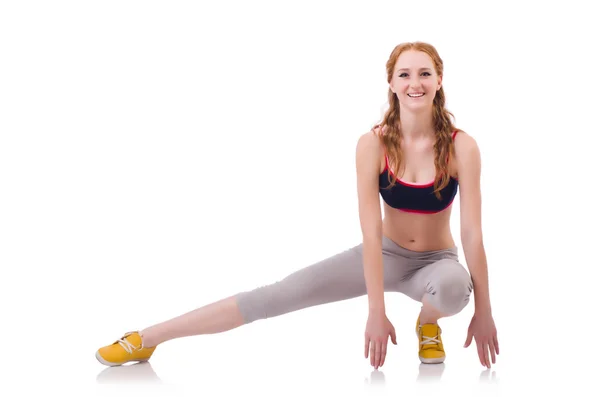 Jeune femme faisant des exercices sur blanc — Photo