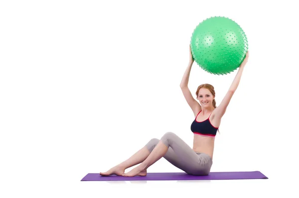 Mujer haciendo ejercicio con pelota suiza sobre blanco —  Fotos de Stock