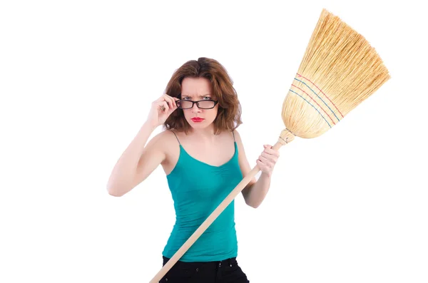 Young woman with broom on white — Stock Photo, Image