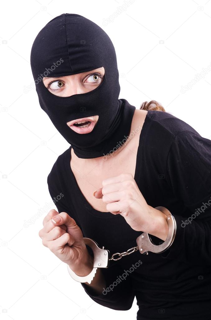 Young female criminal with handcuffs