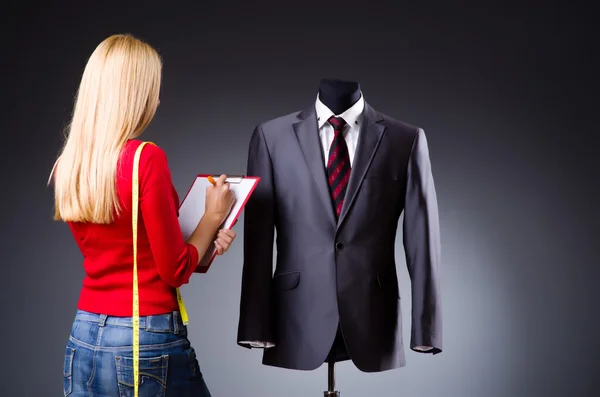 Young tailor isolated on the white — Stock Photo, Image