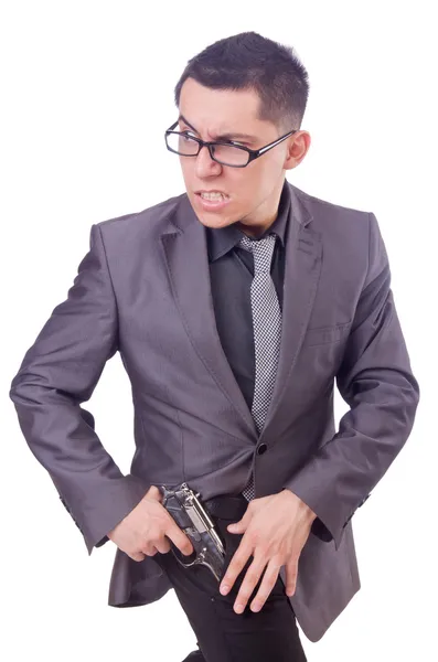 Empresário engraçado com arma no branco — Fotografia de Stock