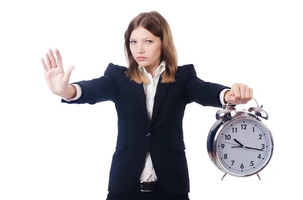Affärskvinna med klockan isolerad på vitt — Stockfoto