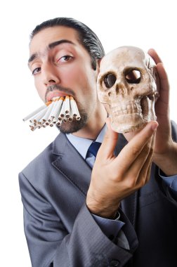 Antismoking concept with man and skull clipart