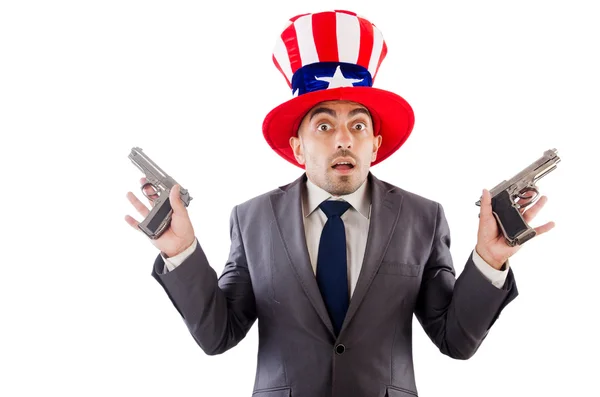 Άνθρωπος με όπλο και αμερικανική καπέλο — Φωτογραφία Αρχείου