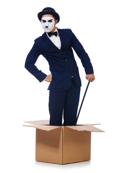 Человек с тростью в коробке — стоковое фото