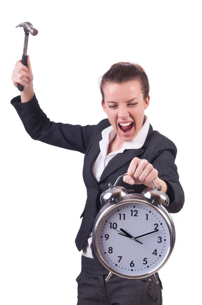 Woman trying to break the clock — Stock Photo, Image