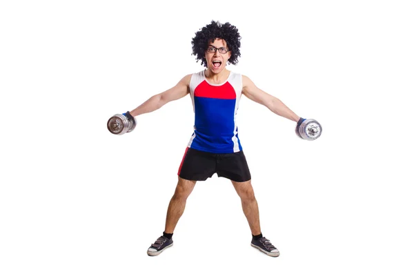 Hombre divertido haciendo ejercicio con pesas — Foto de Stock