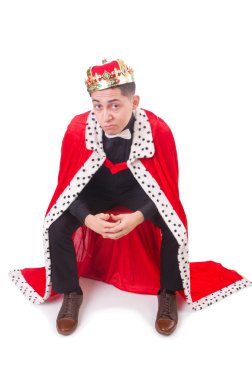 Taçlı bir iş adamı beyazlar içinde.