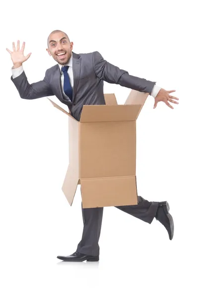 Businessman with box isolated on the white — Stock Photo, Image