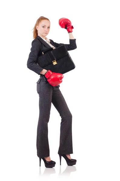 Femme d'affaires avec gants de boxe sur blanc — Photo