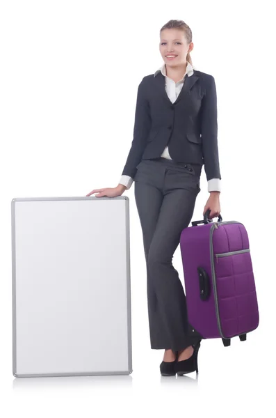 Mujer preparándose para las vacaciones con maleta en blanco —  Fotos de Stock