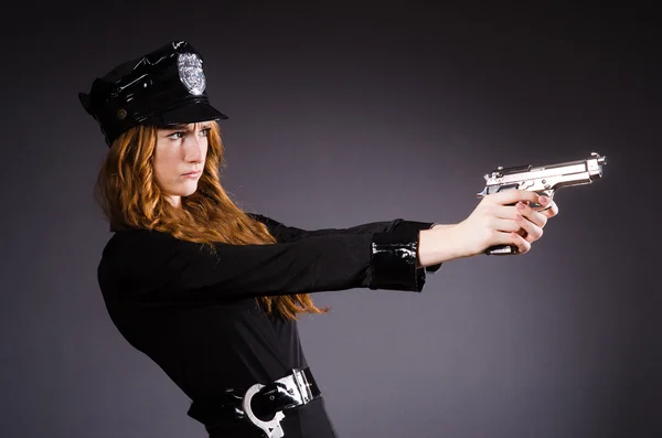 Woman police office with gun — Stock Photo, Image