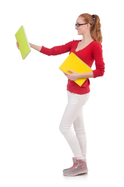 Junge Studentin mit Büchern auf weiß — Stockfoto