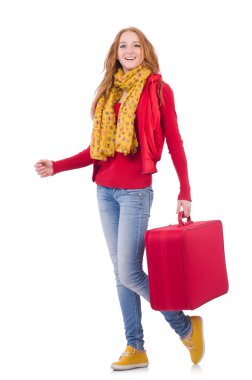 Beyaz bavulla tatile hazırlanan kadın.