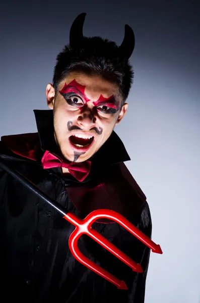 Man in devil costume in halloween concept — Stock Photo, Image