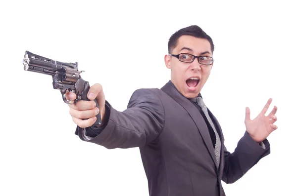 Homme d'affaires drôle avec arme sur blanc — Photo