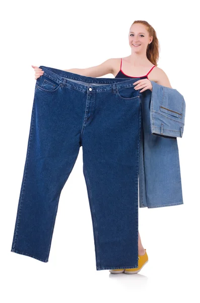 穿着大牛仔裤的女性节食观念 — 图库照片