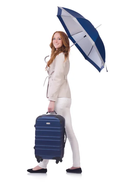 Femme se préparant pour les vacances avec valise sur blanc — Photo