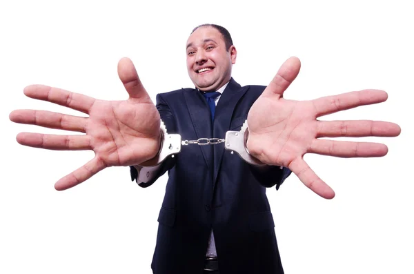 Бизнесмен в наручниках на белом — стоковое фото