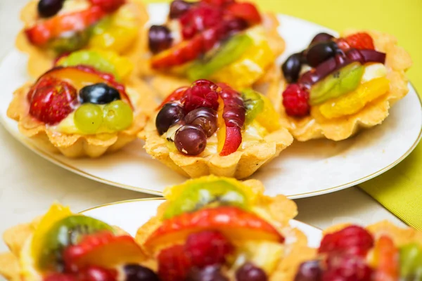 Tasty sweets in the plate — Stock Photo, Image