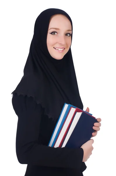 Jovem estudante muçulmano com livros sobre branco — Fotografia de Stock