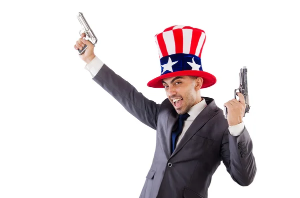 Człowiek z pistoletem i amerykański kapelusz — Zdjęcie stockowe
