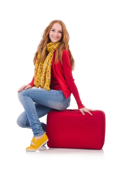Mujer preparándose para las vacaciones con maleta en blanco —  Fotos de Stock