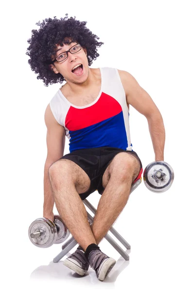 Hombre divertido haciendo ejercicio con pesas — Foto de Stock