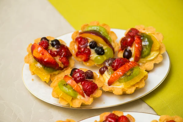 Tasty sweets in the plate — Stock Photo, Image