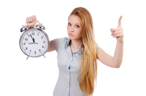 Young woman with clock on white — Stock Photo, Image