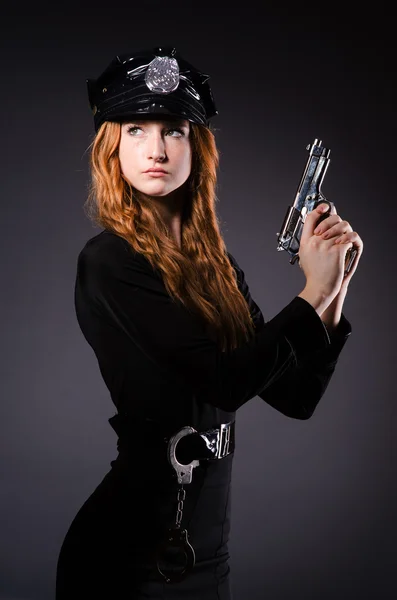 Woman police office with gun — Stock Photo, Image