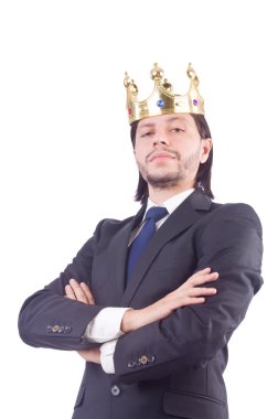 Taçlı bir iş adamı beyazlar içinde.