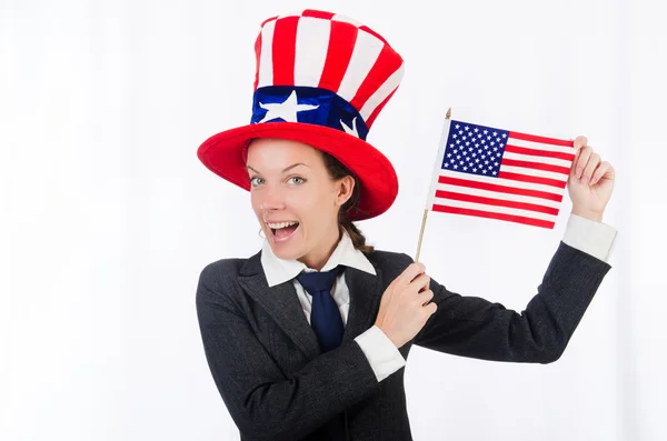 Young woman with american symbols on white — Stock Photo, Image