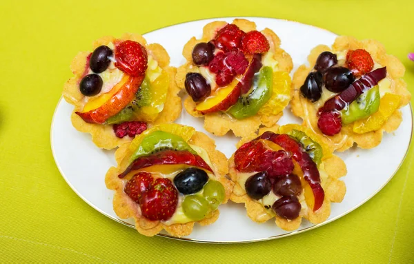 Tasty sweets in the plate — Stock Photo, Image